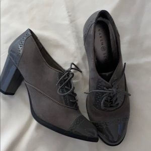 Gray patent and faux suede lace up shoes.